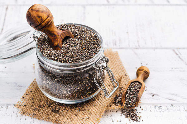 Healthy chia seeds in a glass jar. Healthy eating concept. Copy space